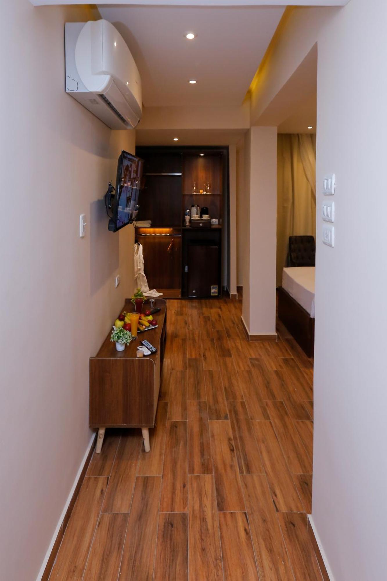 Kafret el-Gabal Steps In Pyramids View酒店 外观 照片