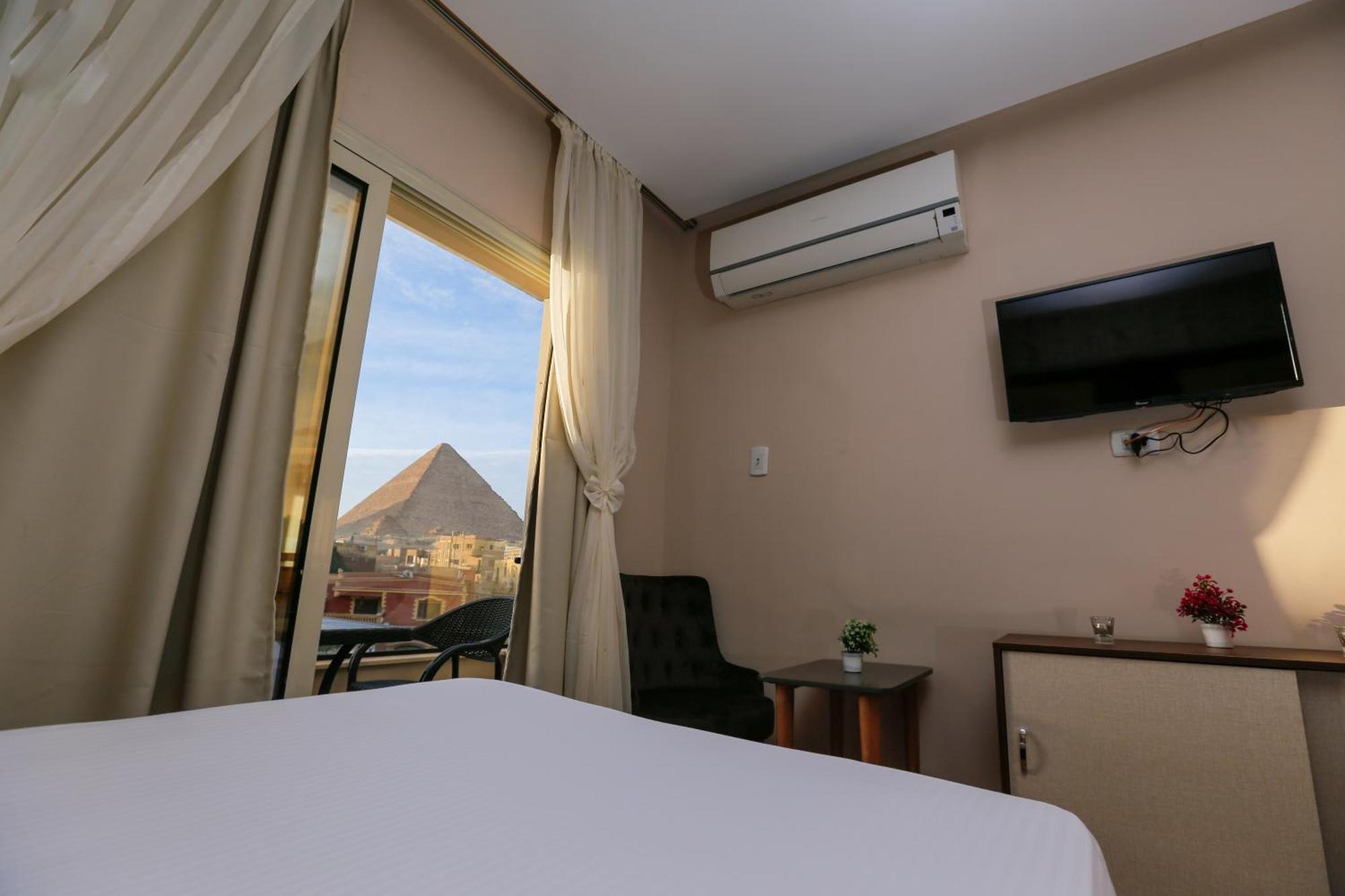 Kafret el-Gabal Steps In Pyramids View酒店 外观 照片
